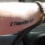 Jonathan's arm with tattoo and bracelet